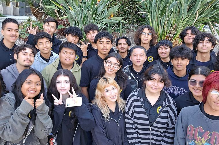 The Academy cohort together outdoors